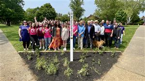 Pic of peace pole and interact students